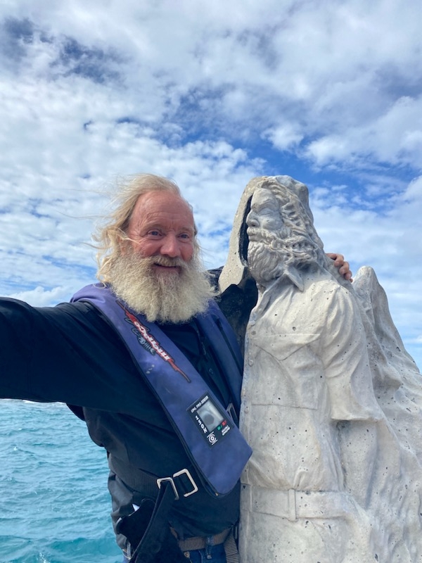 Dr. Vaughan with the underwater sculpture