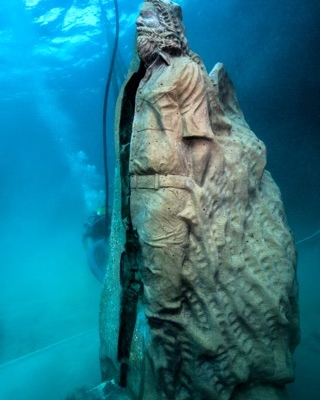 Statue in water